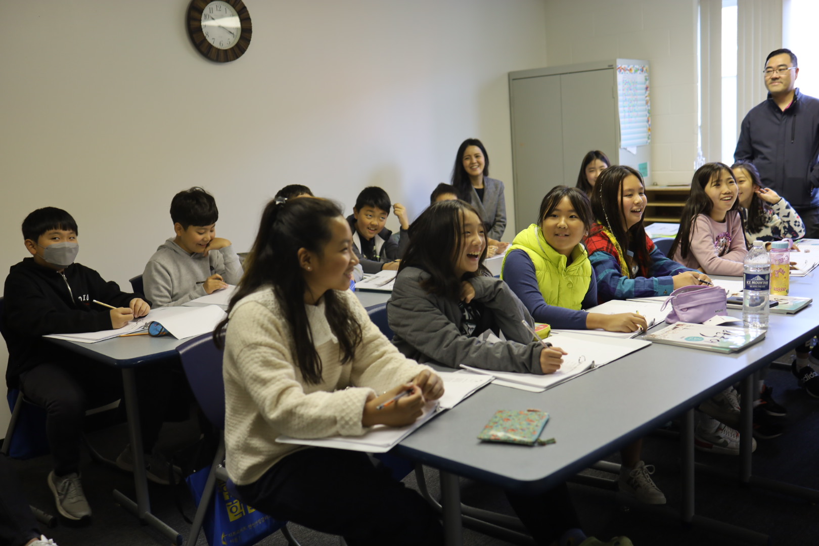 Language education lies at the center of ethnic education. Fifth-graders taking a class