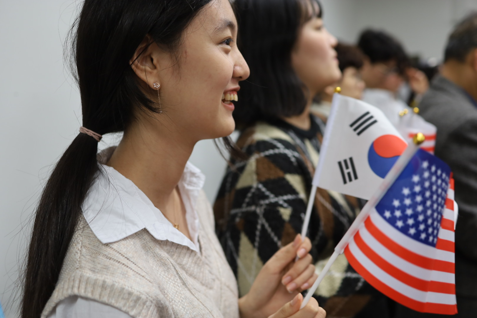 Participants of the ceremony celebrates the March 1 Independence Movement by giving three cheers for the nation.