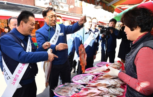 현대차노사, 설 대목 온누리상품권 63억원 구매…전통시장 활력