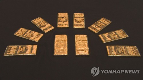 미국과 무역분쟁 중인 중국, 달러보다 금 보유 늘려